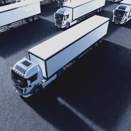 Fleet of new heavy trucks. Transportation, shipping industry. 3D illustration